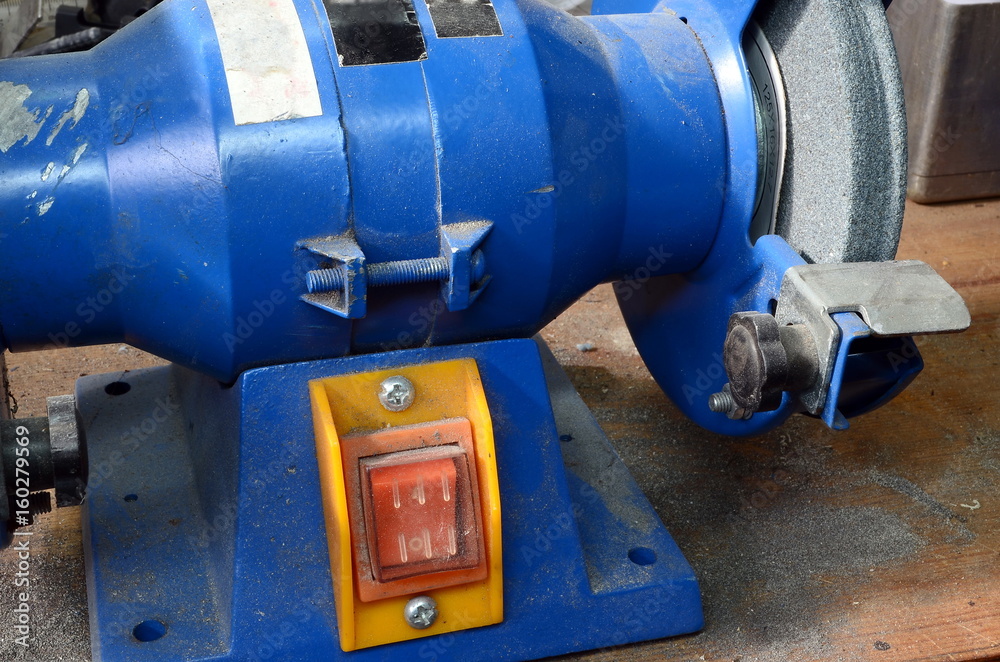 grinding machine, blue color, closeup
