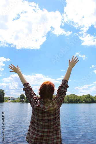  The girl who raised her hands in the sky.