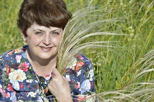 Woman is resting on nature photo