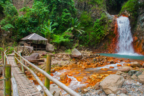 Waterfalls, huge rocks, bridge, Philippines. Valencia, island Negros. photo