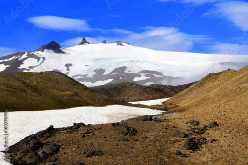 View of the glacier Snaefellsjokull, which was glorified in Jules Verne's Journey to the Center of the Earth as the entry point to the center of the Earth. West Iceland photo