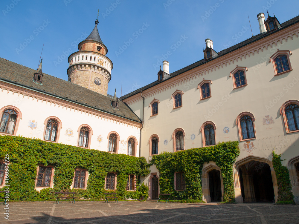 Sychrov Castle courtyard. Neo-Gothic style chateau near Turnov, Czech Republic.