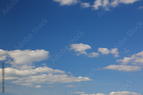 Blue sky with few white clouds