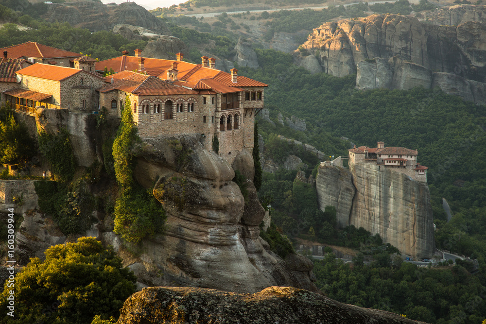 Plakat Meteora monasteries View on the Holy Monastery of Varlaam and Roussanou Monastery on background. Kastraki, Greece
