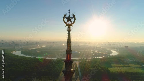 Flying close to Moscow state university star at sunny morning. Moscow cityscape view. Russia. Aerial View.