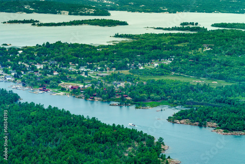 Photography Aerial view houses and trees along coastline, Toronto, Ontario, Canada