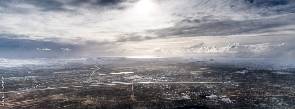 Obraz premium Aerial view of polar landscape and stormy sky, Iceland, Europe.