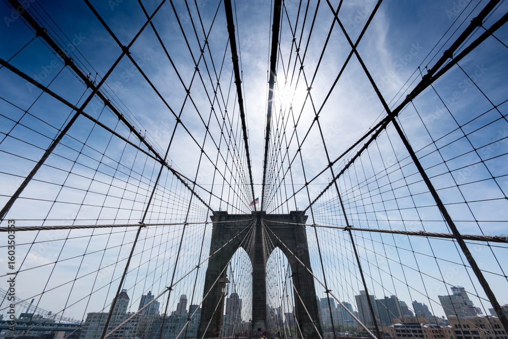 Low angle view of cables on Brooklyn Bridge, New York City, USA. - obrazy, fototapety, plakaty 