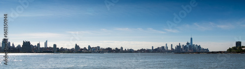 Panoramic view of New York City skyline in distance, New York, USA.