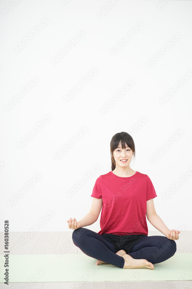 Young woman doing yoga