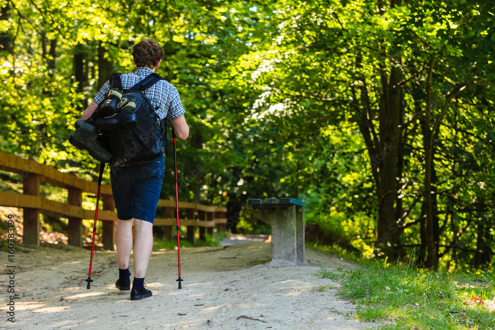 Young man alone in woodland. Young man alone in woodland.