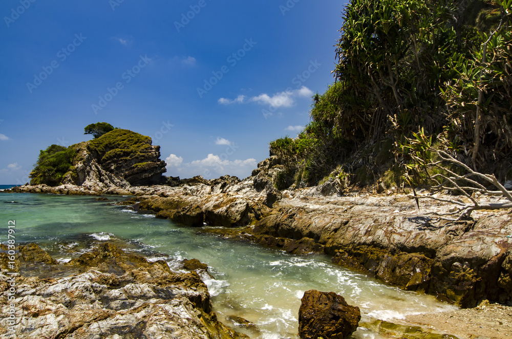 Hidden beauty of Kapas Island located in Terenganu, Malaysia at sunny day. blue sky and clear sea water.