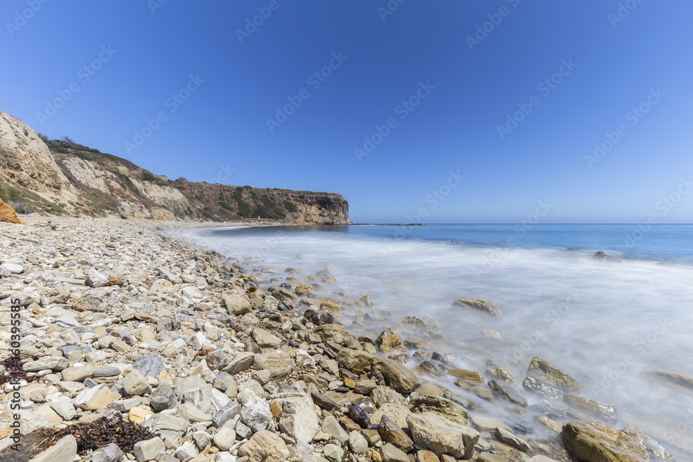 Rocky coast with blurred water motion at Abalone Cove Shoreline Park in Ranch Palos Verdes, California.