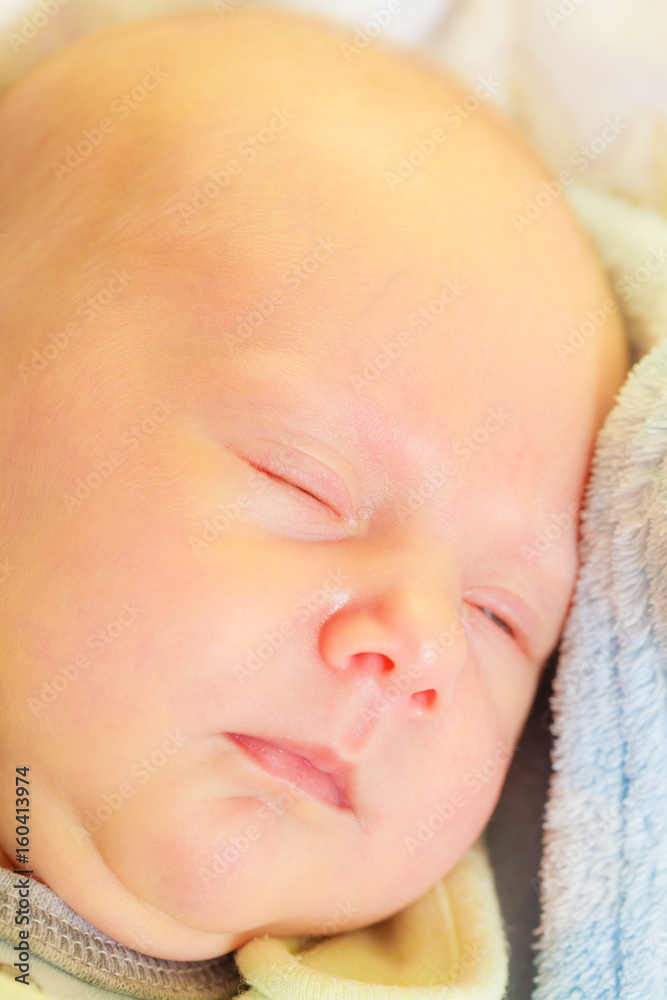 Little newborn baby sleeping calmly in blanket Little newborn baby sleeping calmly in blanket