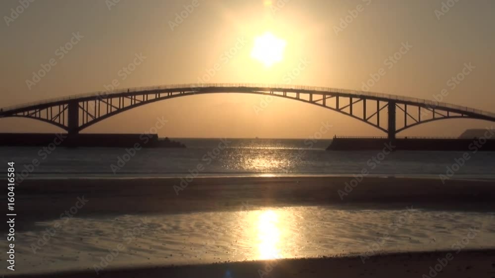 Sunset on the Saikai Rainbow Bridge in Penghu islands, Taiwan. The bridge is officially named Xiying Hong Bridge. The total length is about 200 meters. Sunset on the Saikai Rainbow Bridge in Penghu islands, Taiwan. The bridge is officially named Xiying Hong Bridge. The total length is about 200 meters.