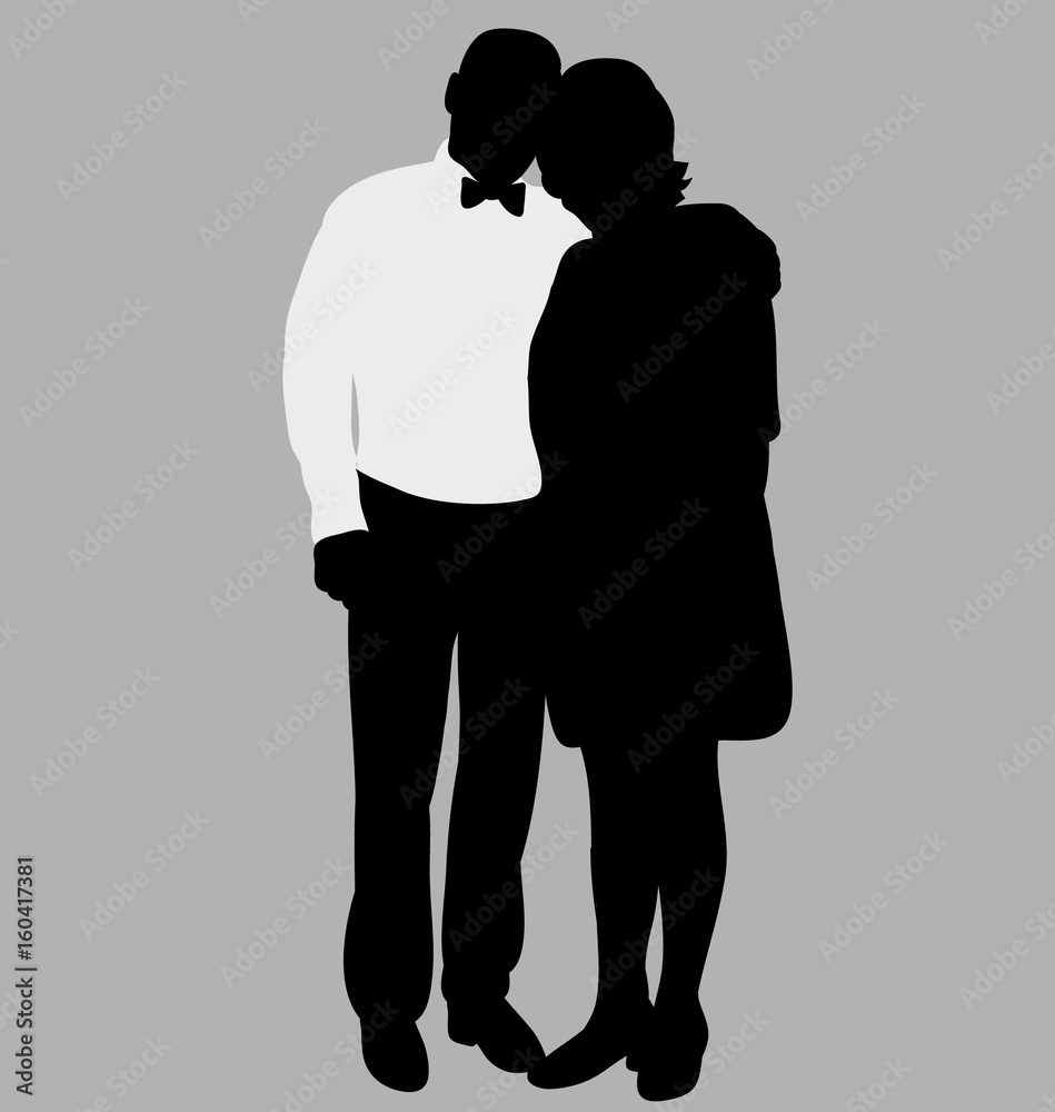 Silhouette of a man and woman on a gray background