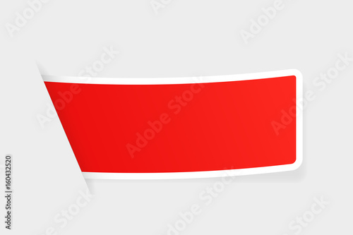 Red sticker with white border on gray background