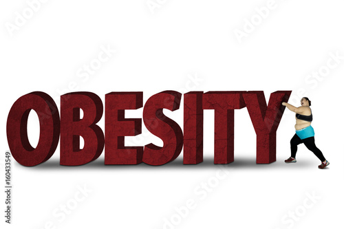 Fat woman crushing word of obesity