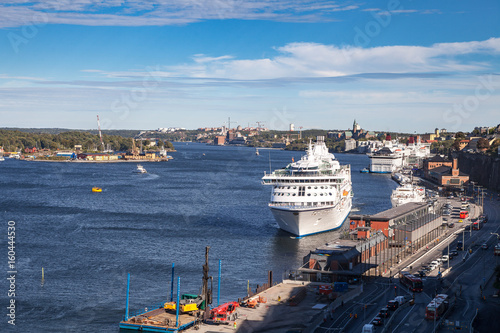 STOCKHOLM, SWEDEN - SEPTEMBER, 16, 2016: Big white line cruise ship, terminal near old town photo