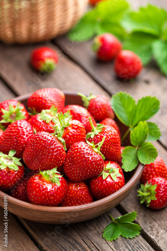 Fresh juicy strawberries with leaves. Strawberry.