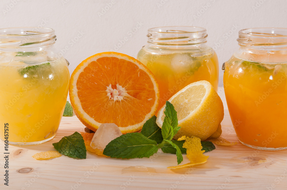 Orange fresh and lemonade in jars Orange fresh and lemonade in jars