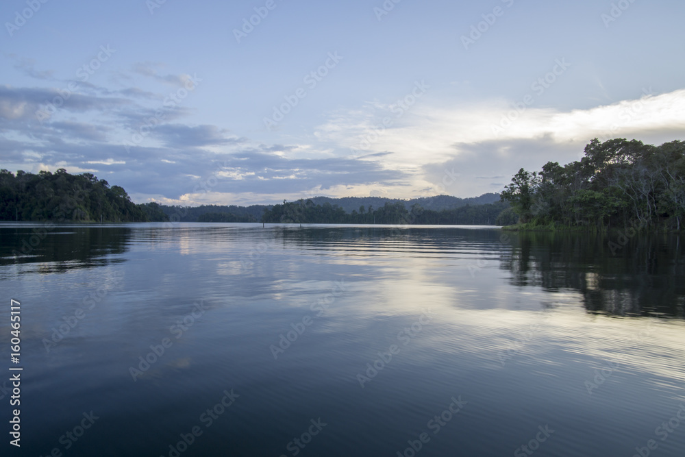 View of man-made lake of Royal Belum with nice green scenery and stumped wood. View of man-made lake of Royal Belum with nice green scenery and stumped wood.