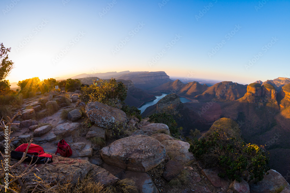 Blyde River Canyon, famous travel destination in South Africa. Last sunlight on the mountain ridges. Ultra wide angle view from above.
