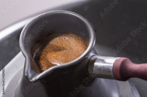 Coffee in turk is cooked on the stove