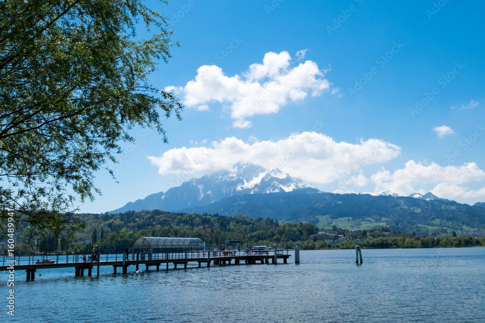 Ferry port at Lucern park which there is mountain as background.