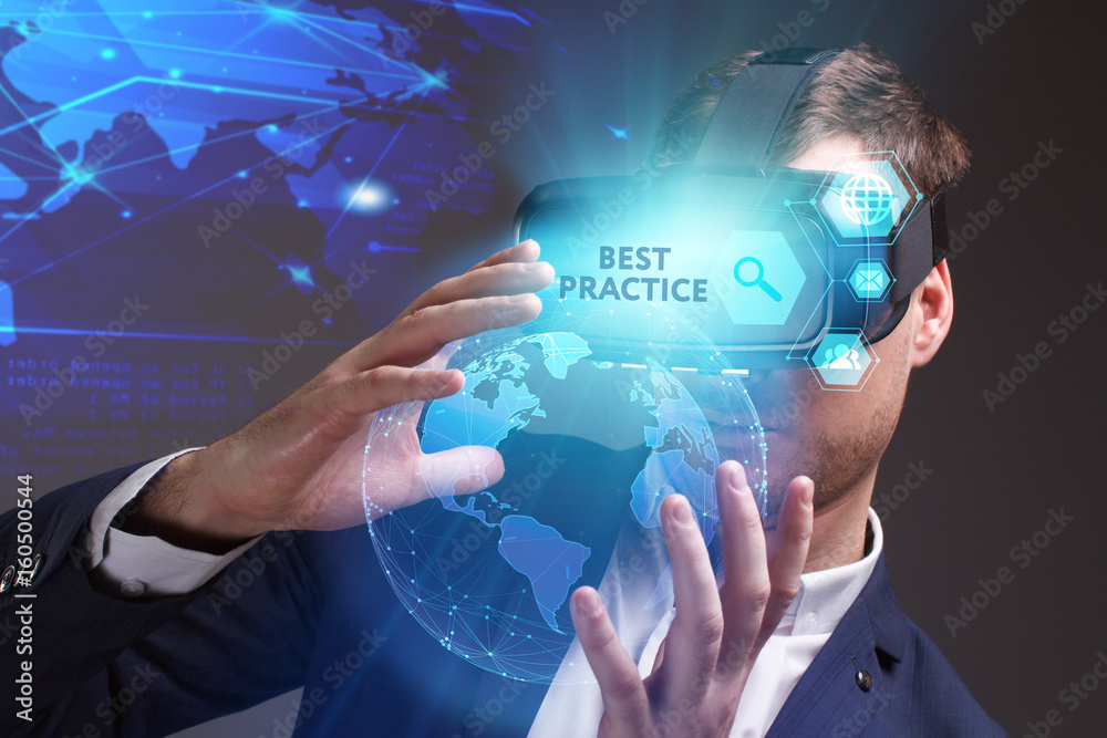 Business, Technology, Internet and network concept. Young businessman working on a virtual screen of the future and sees the inscription: Best practice Business, Technology, Internet and network concept. Young businessman working on a virtual screen of the future and sees the inscription: Best practice