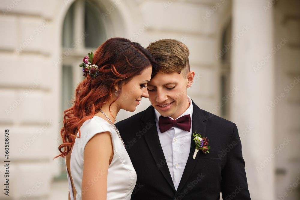 Wedding portrait of beautiful bride and groom in love Wedding portrait of beautiful bride and groom in love