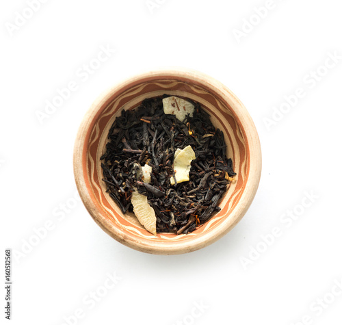 Black tea with pieces of dried fruits, topview