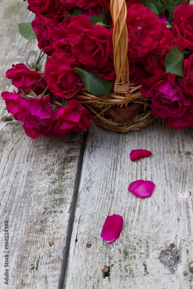 Rose petals in a cute wicker basket Rose petals in a cute wicker basket