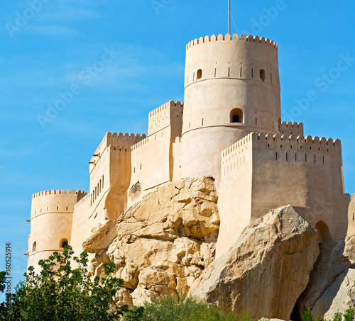 in oman muscat rock the old defensive fort battlesment sky and star brick