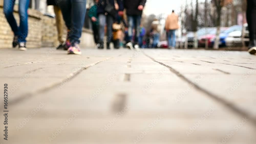 People going to the camera. people's feet. urban bustle People going to the camera. people's feet. urban bustle
