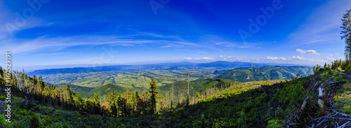 Mountain summer panorama landscape. Beskidy mountain in southern Poland. View at Żywiec, Żywieckie Lake and Babia Góra.