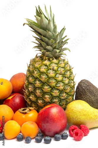 assortment of fresh fruits on white background