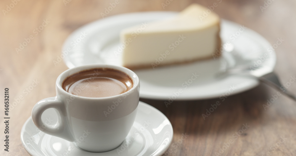 espresso and cheesecake on table espresso and cheesecake on table