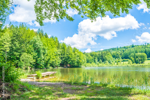 A beautiful view of Waldweiher lake, Dietramszell, Bavaria, Germany