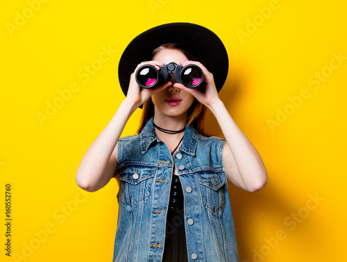 woman in hat with binocular