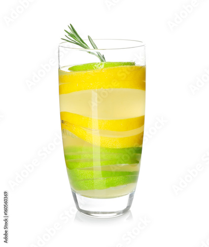 Glass of tasty lemonade with slices of citrus fruits on white background