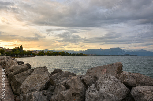 Cloudy skies over the pier in Desenzano at lake Garda