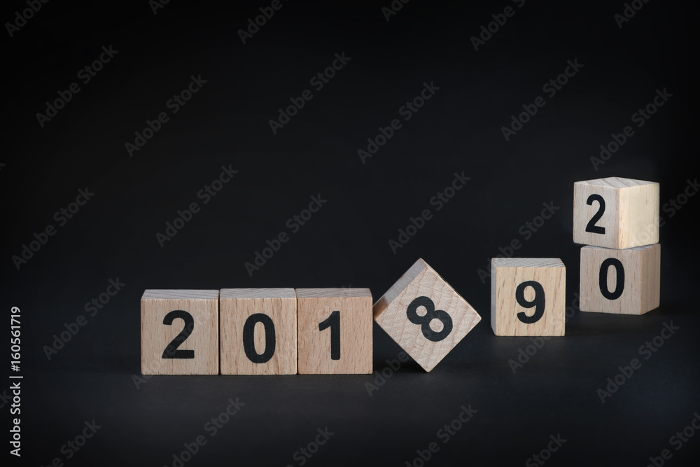 Obraz premium 2018, 2019 and 2020 on black background, happy new year concept and holiday and event idea