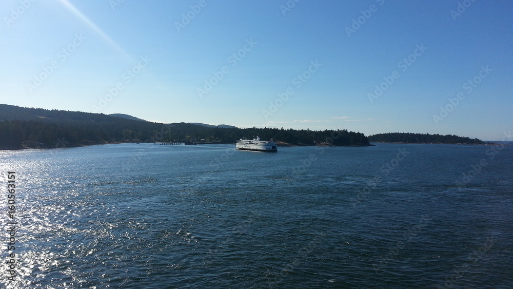 sunlight ocean with ferry