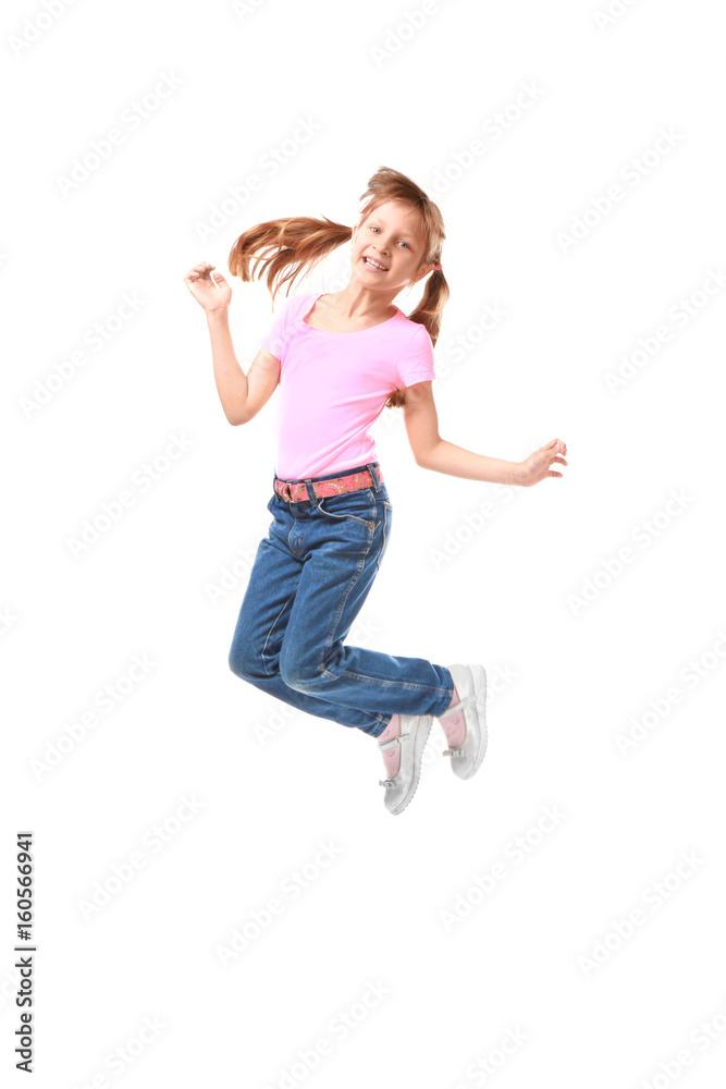 Little jumping girl on white background