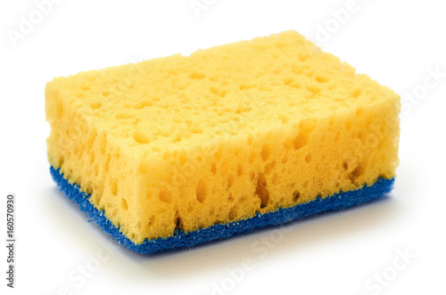 New and clean sponge for cleaning. Isolated on white background photo
