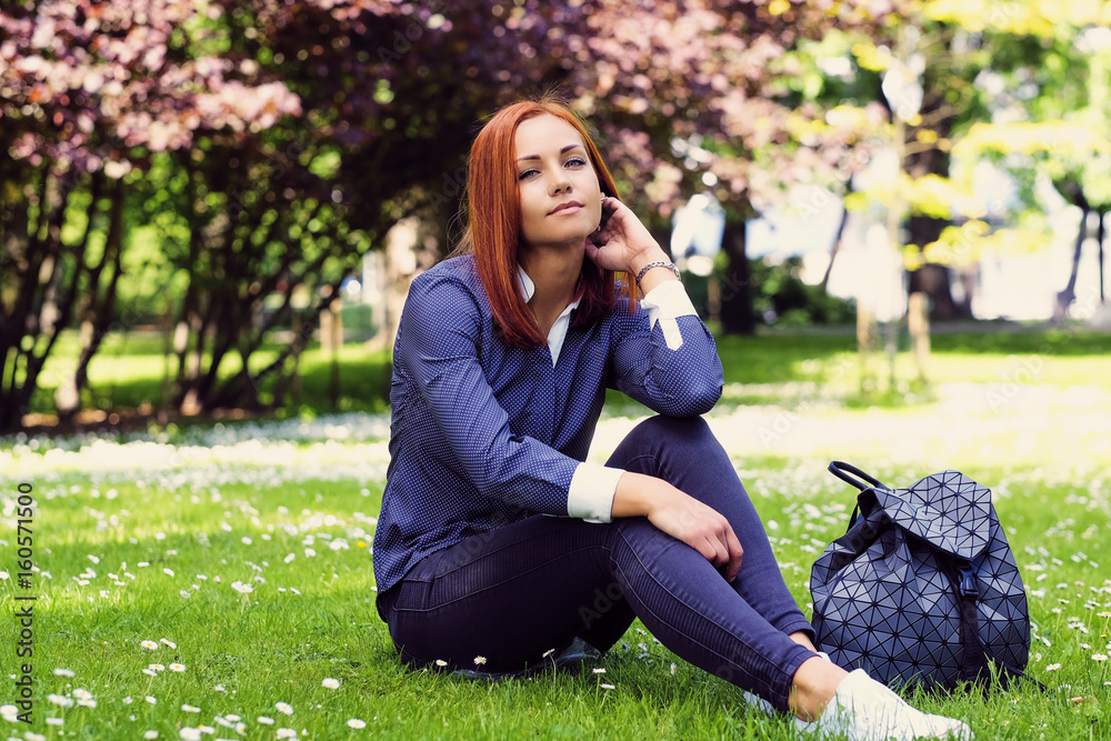 Positive redhead female with backpack. Positive redhead female with backpack.