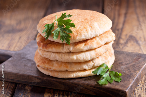 pita bread on a wooden board