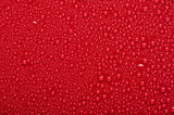 Water drops on a red background