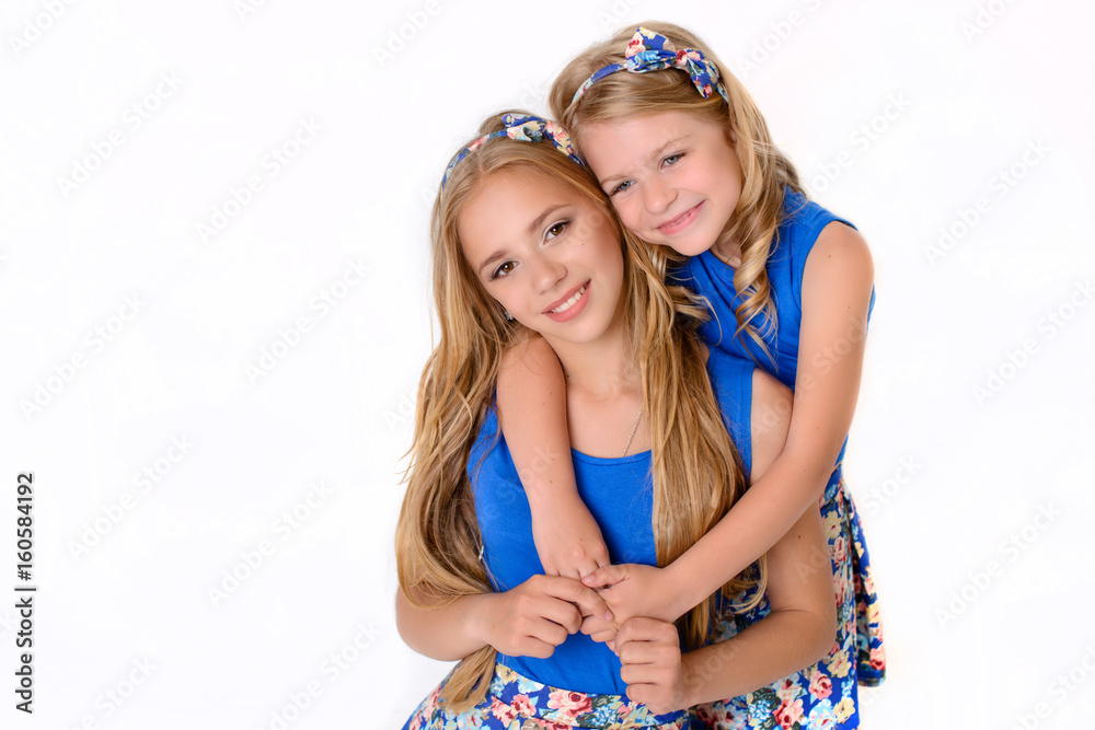 Two beautiful girls in a studio Two beautiful girls in a studio